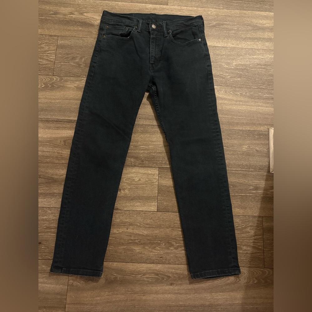 Levi’s Blank Tab 502 Taper Jeans in Black